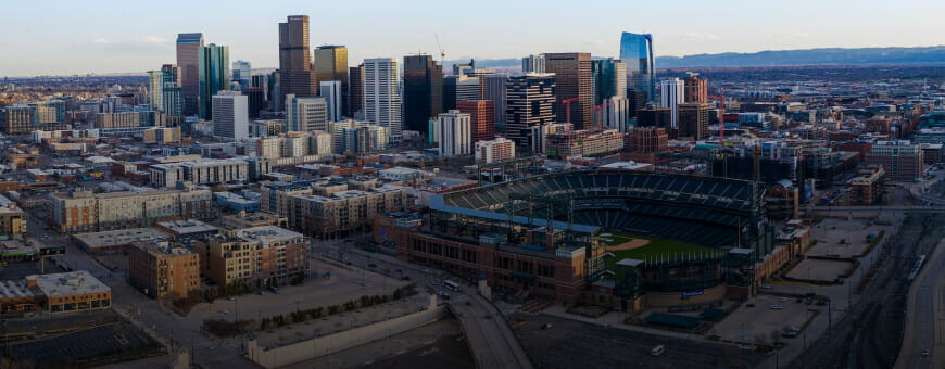An aerial view of the baseball stadium and downtown area in Denver, Colorado.